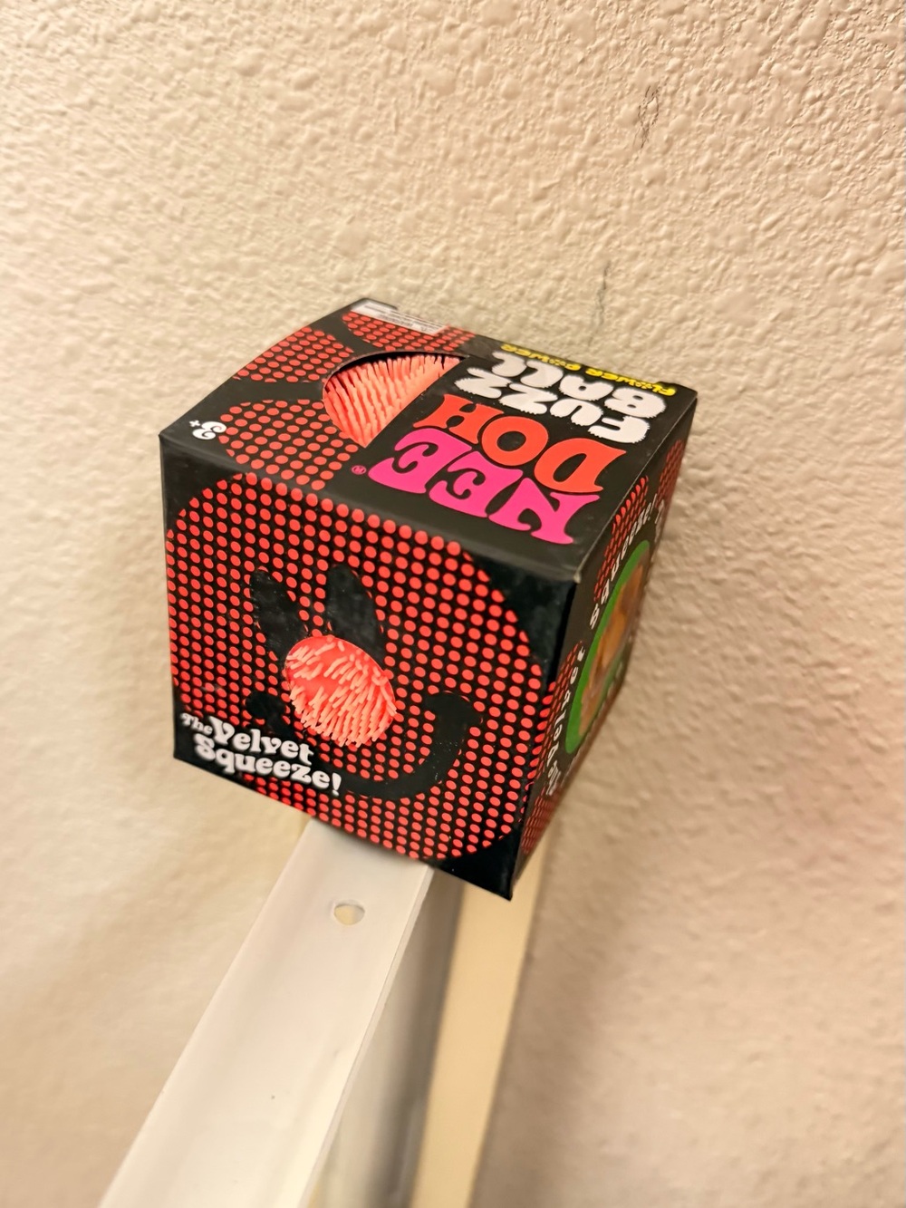 NeeDoh Flower Power fuzz ball Orange